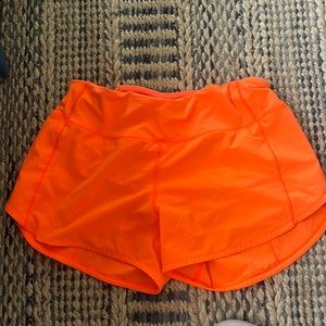 Size 6 Orange Lulu lemon shorts